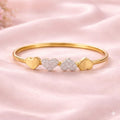 Four Heart Gold Bangle