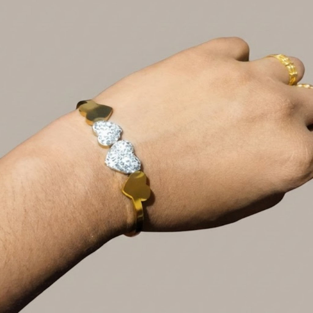 Four Heart Gold Bangle