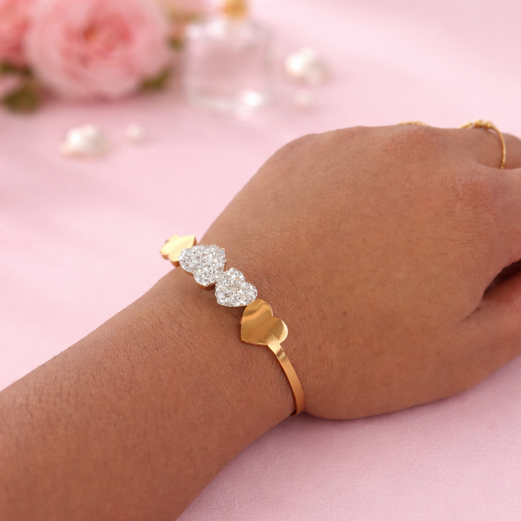 Four Heart Gold Bangle